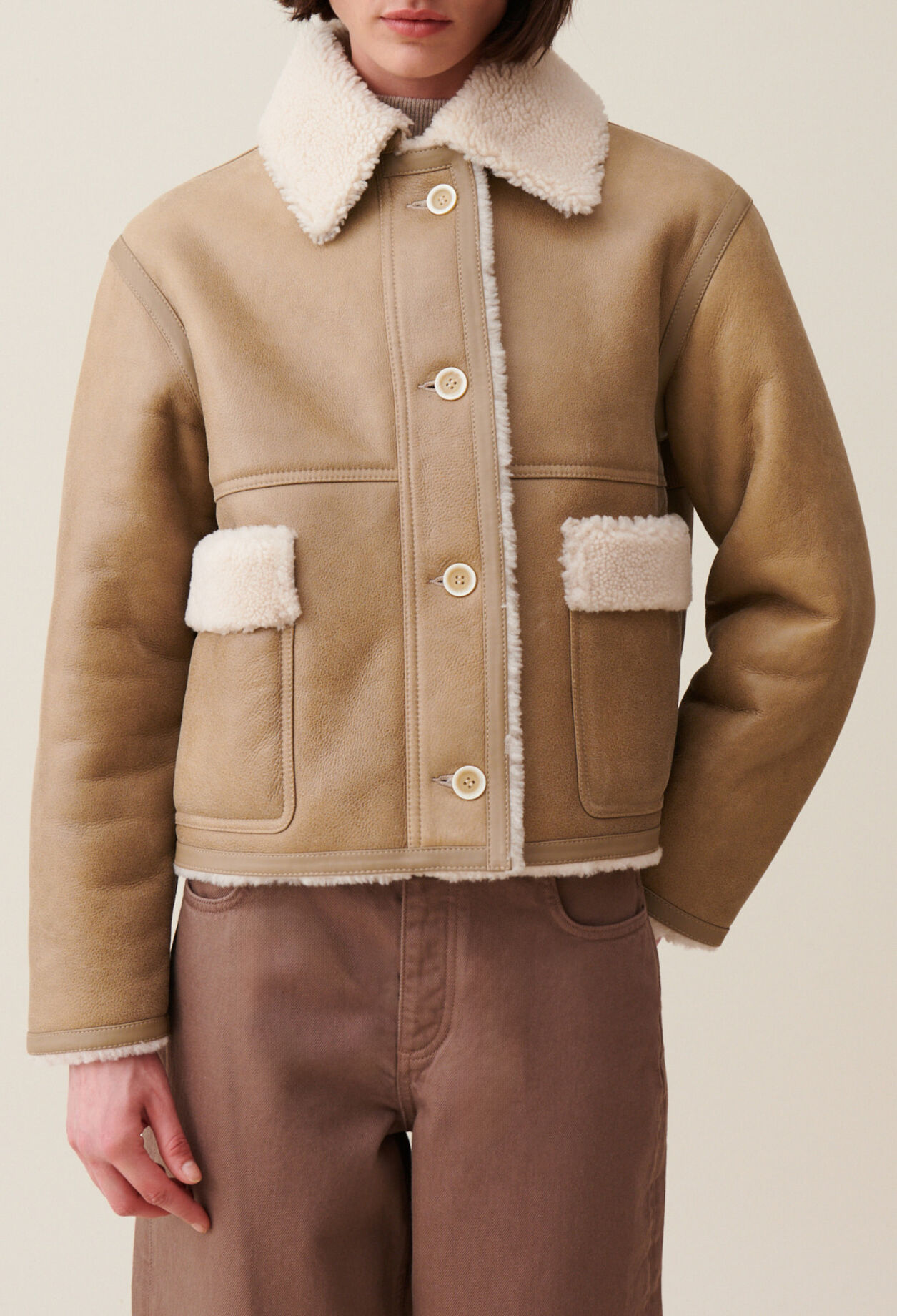 Short beige shearling jacket
