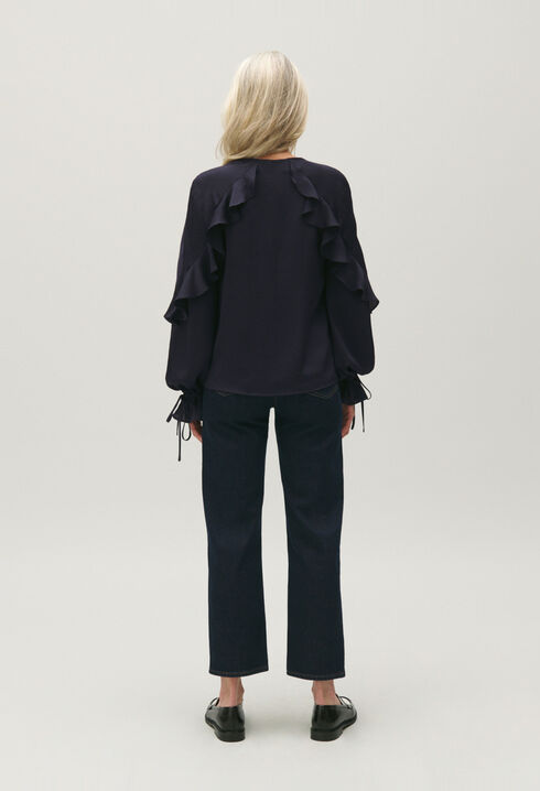 Navy blue ruffled blouse