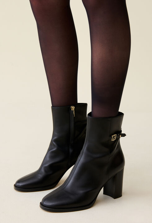 Patent leather heeled ankle boots