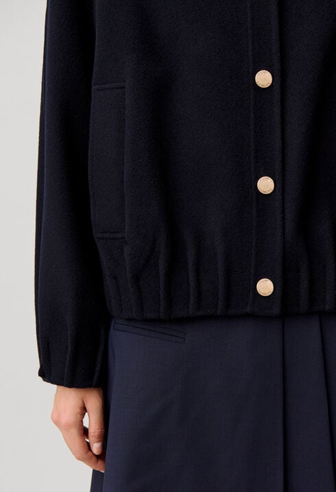 Oversized jacket with gold poppers