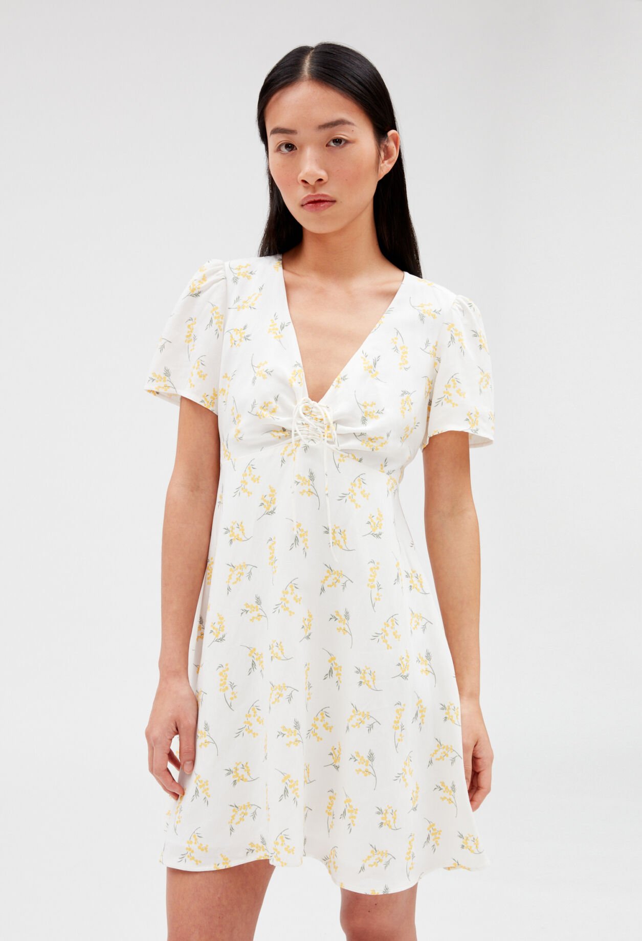 Short flared dress with mimosa pattern