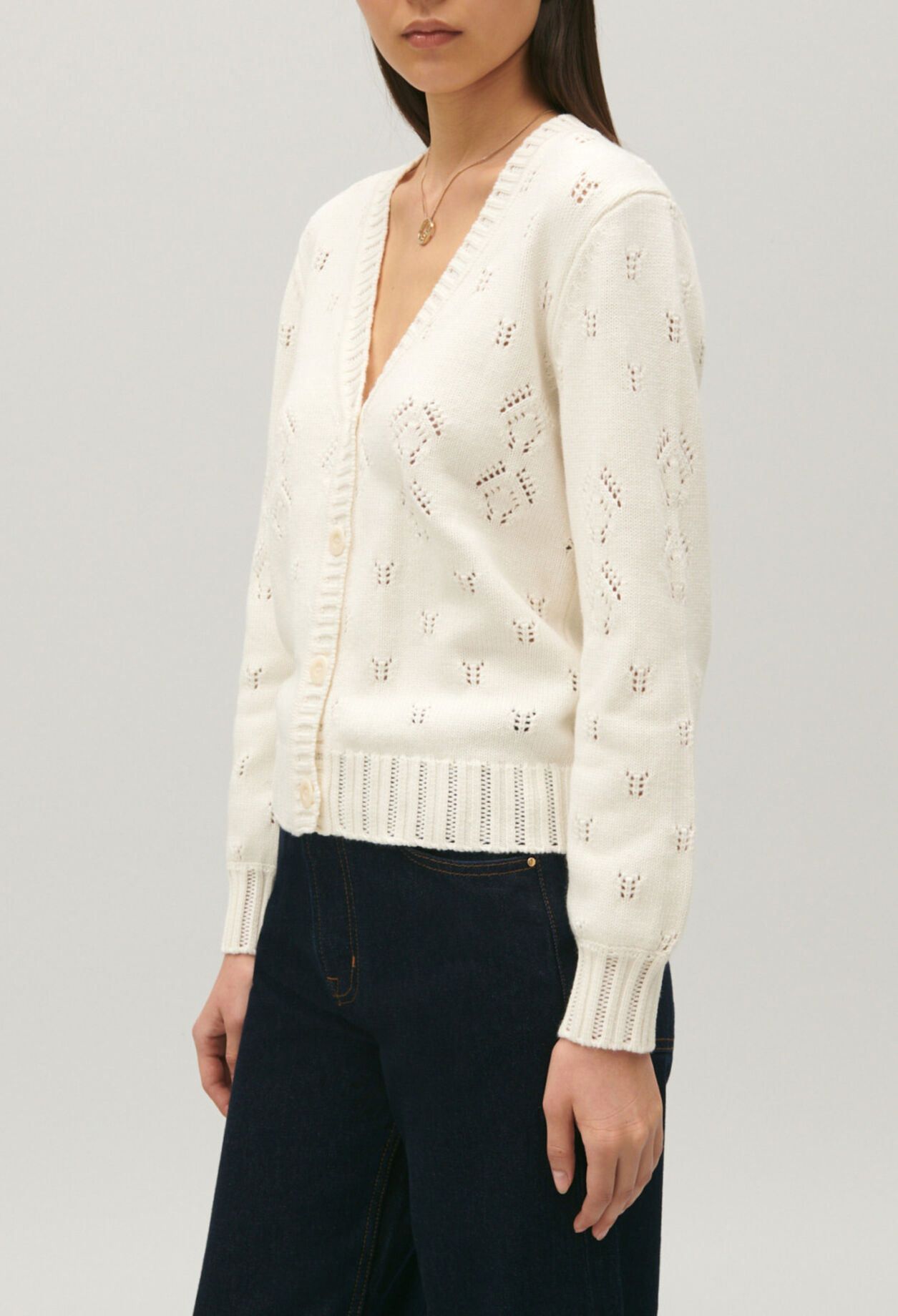 Ecru openwork knitted cardigan