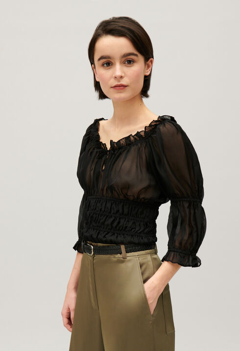 Short black ruffled blouse