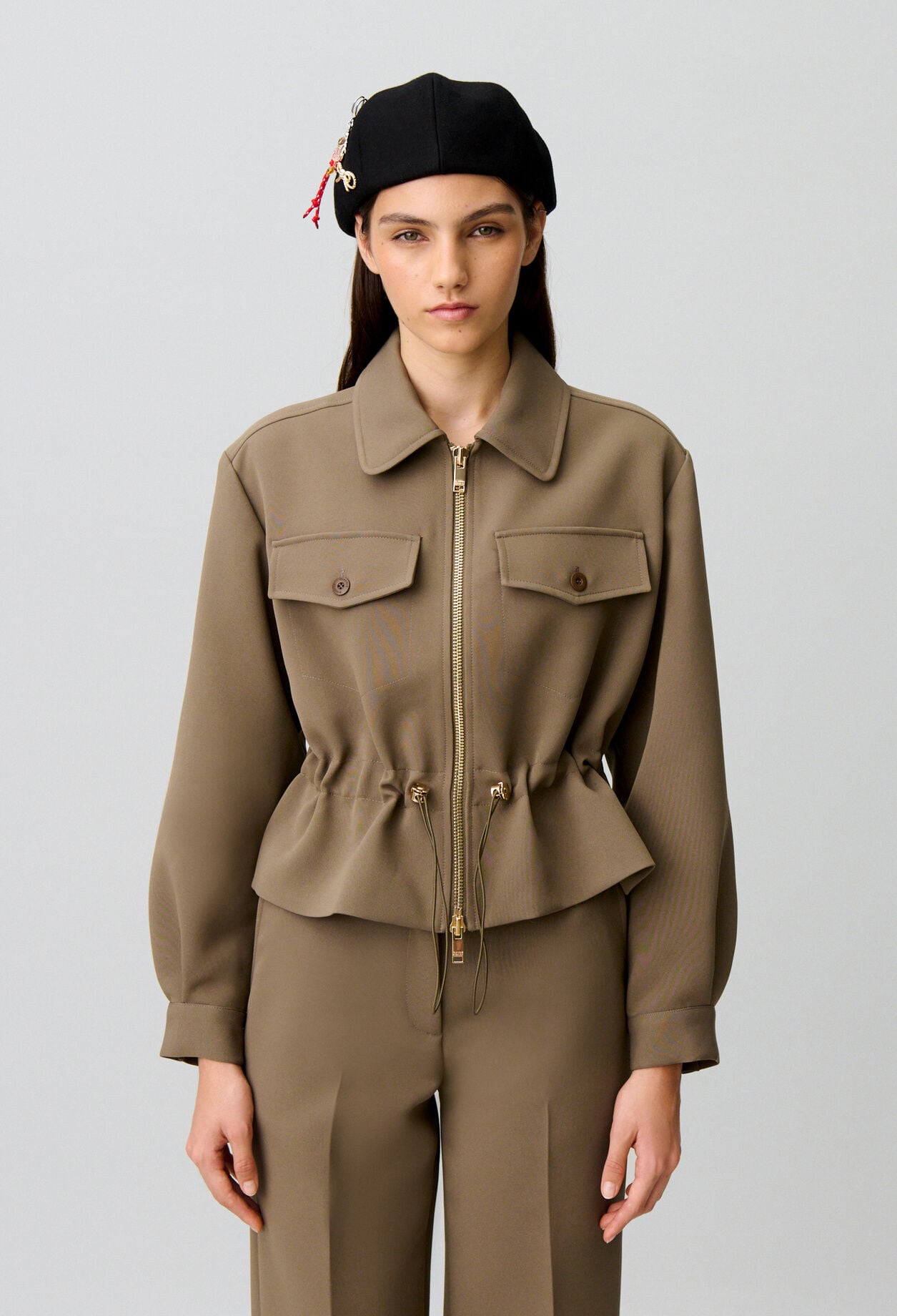 Veste &agrave; basque fleur dor&eacute;s
