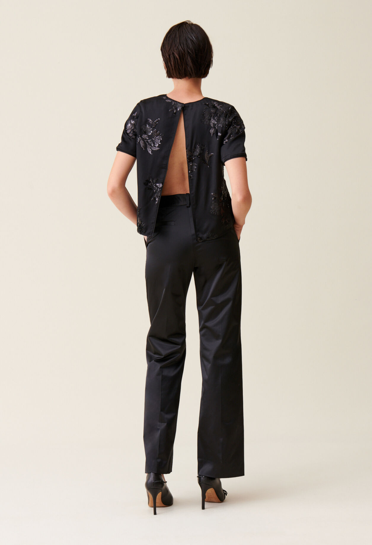 Black top with embroidered sequins