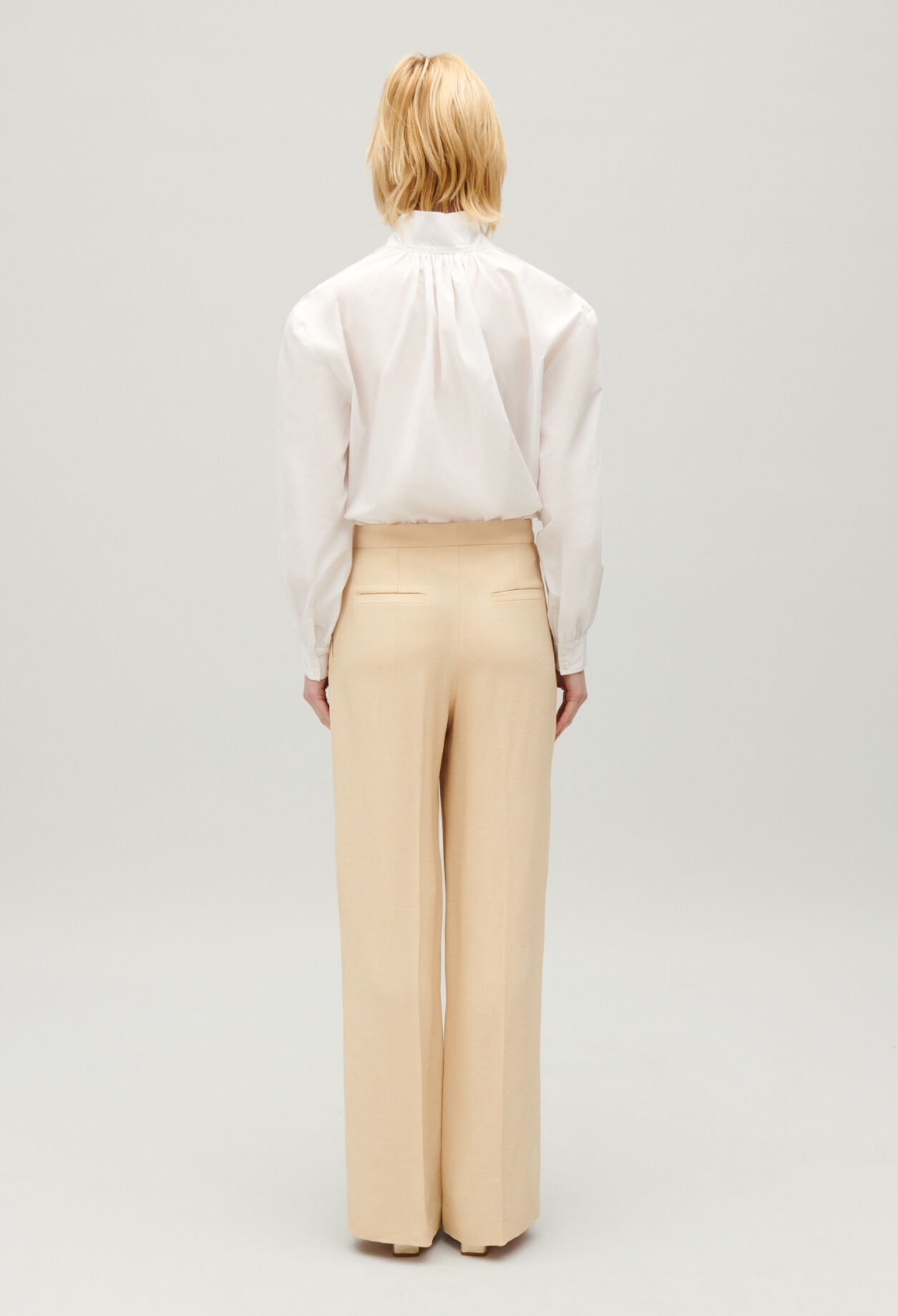Wide-leg beige trousers