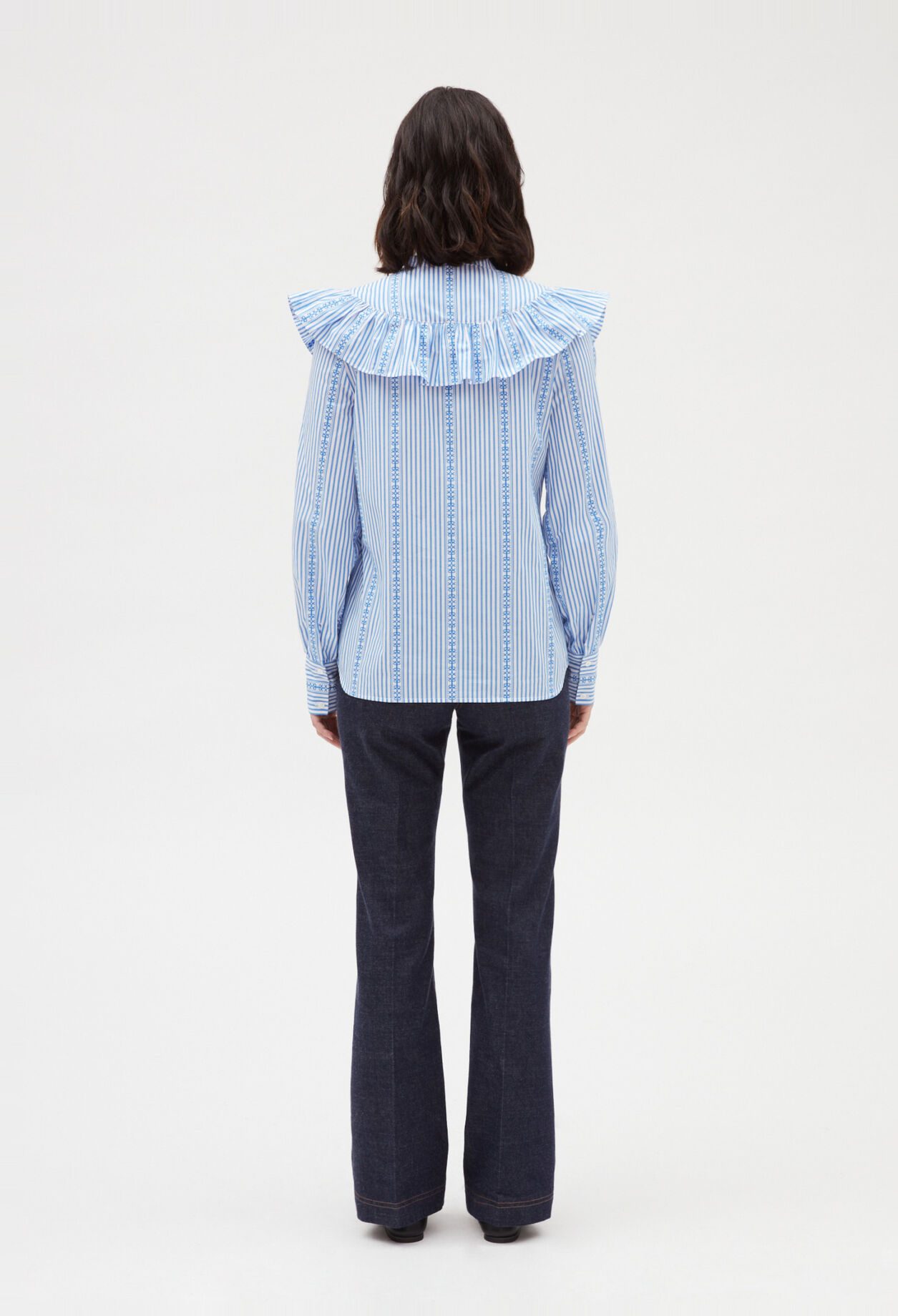 Blue long-sleeved ruffle shirt