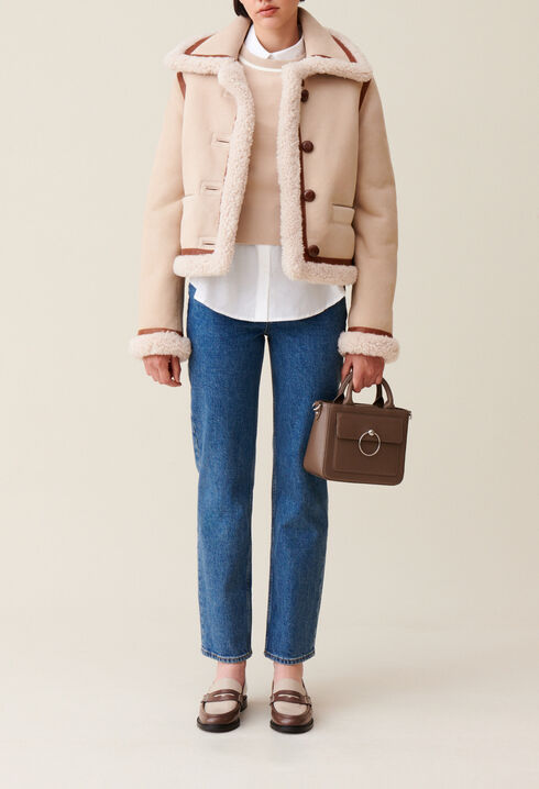 Beigefarbene Lammfelljacke
