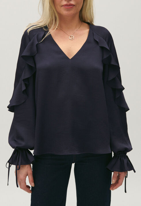 Navy blue ruffled blouse