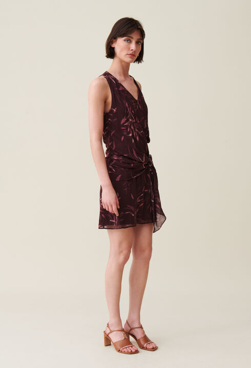 Short fluid dress without sleeves lined
