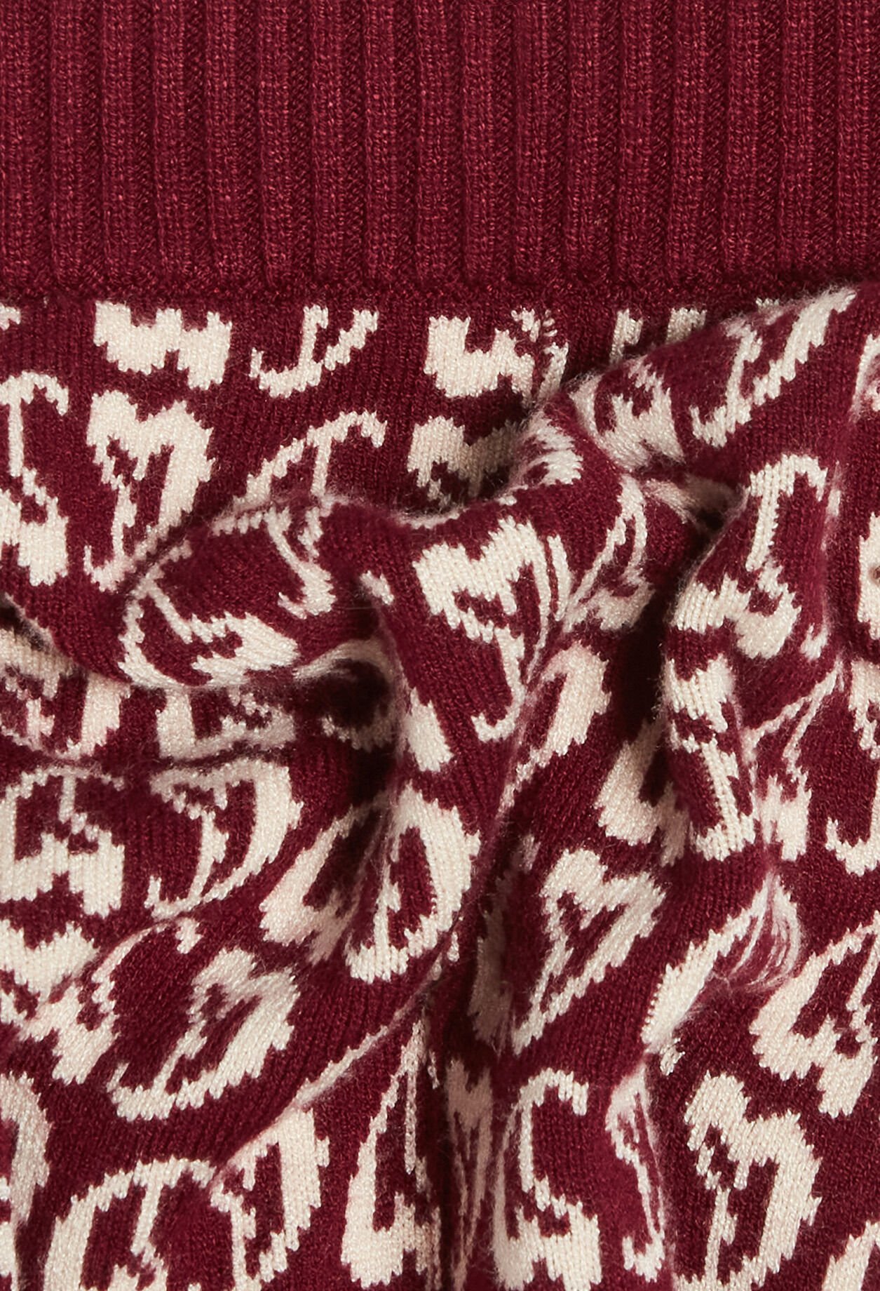 Pantalon bicolore maille imprimé cœur