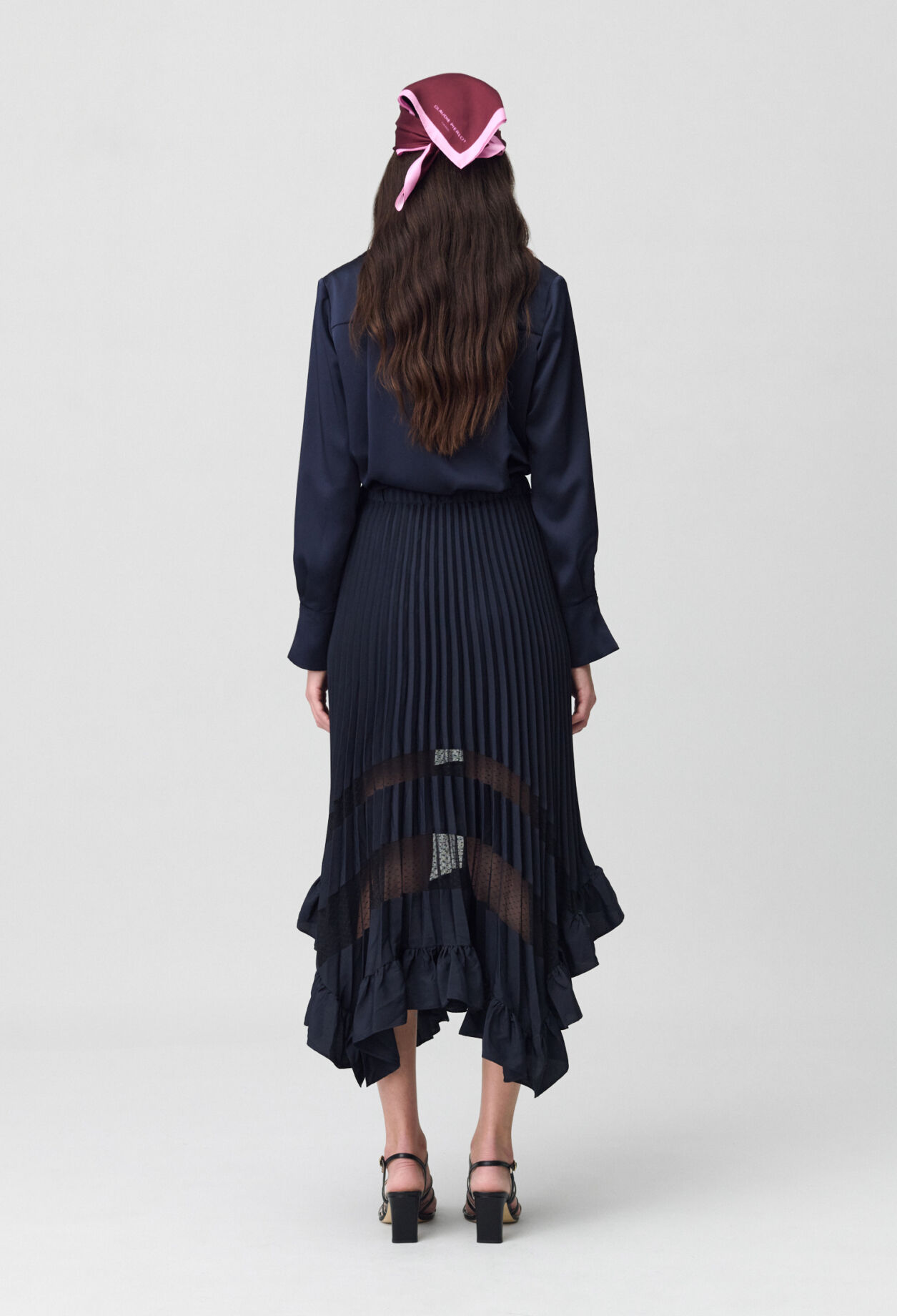 Jupe midi plissée et asymétrique