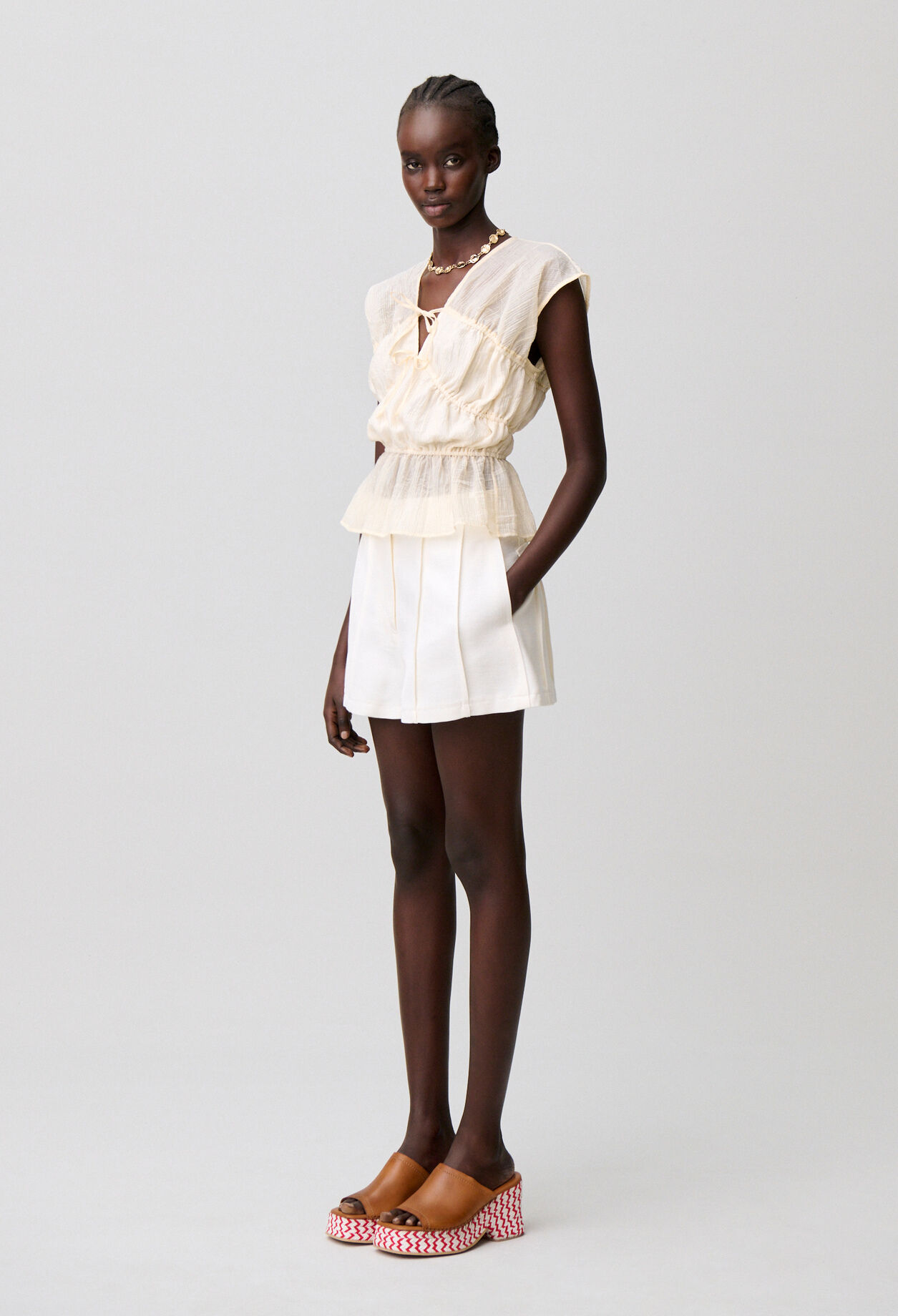 Short surpiqu&eacute; couture