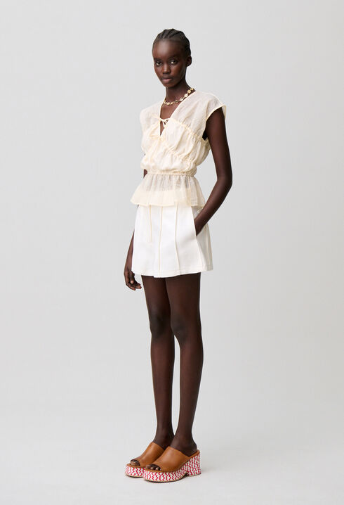 Short surpiqu&eacute; couture