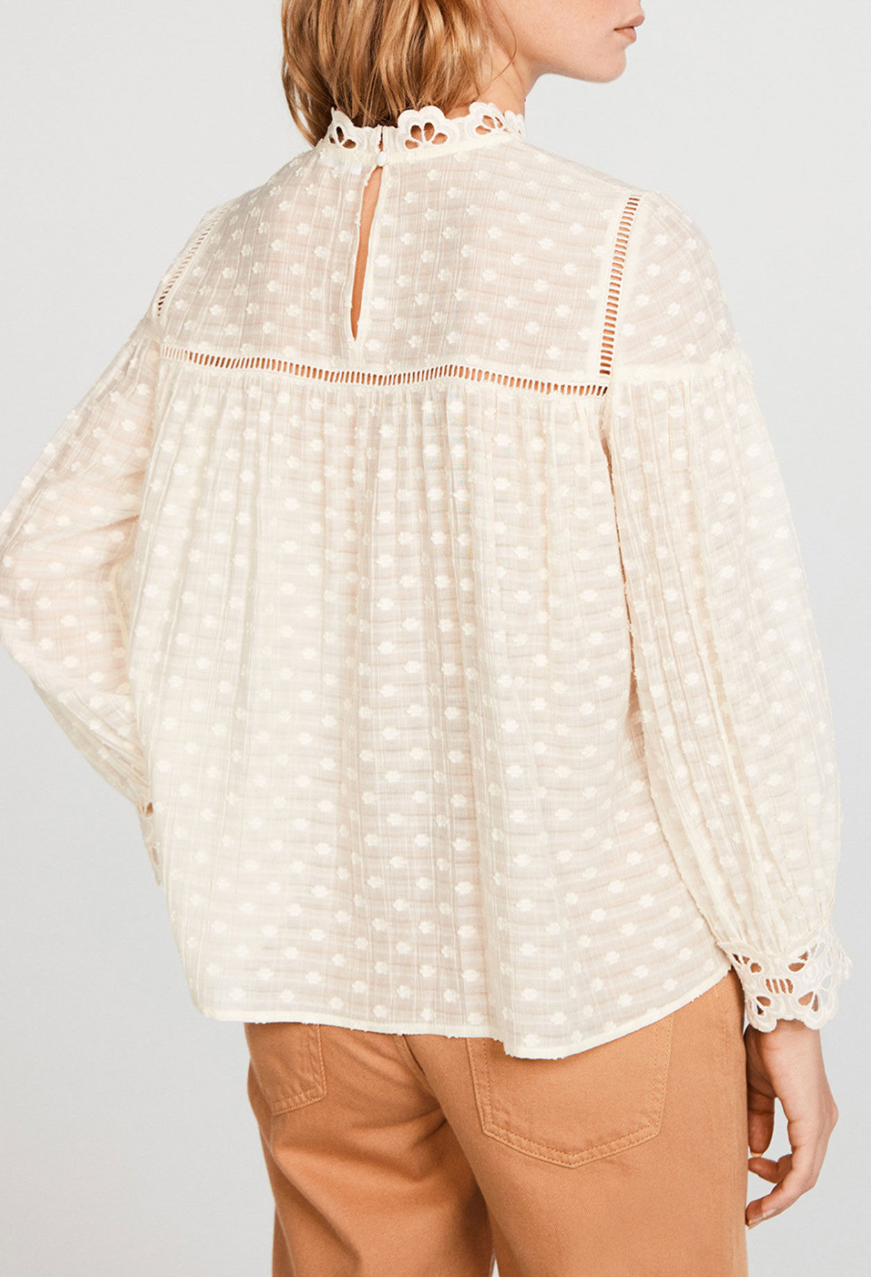 Bluse mit Tupfenmull