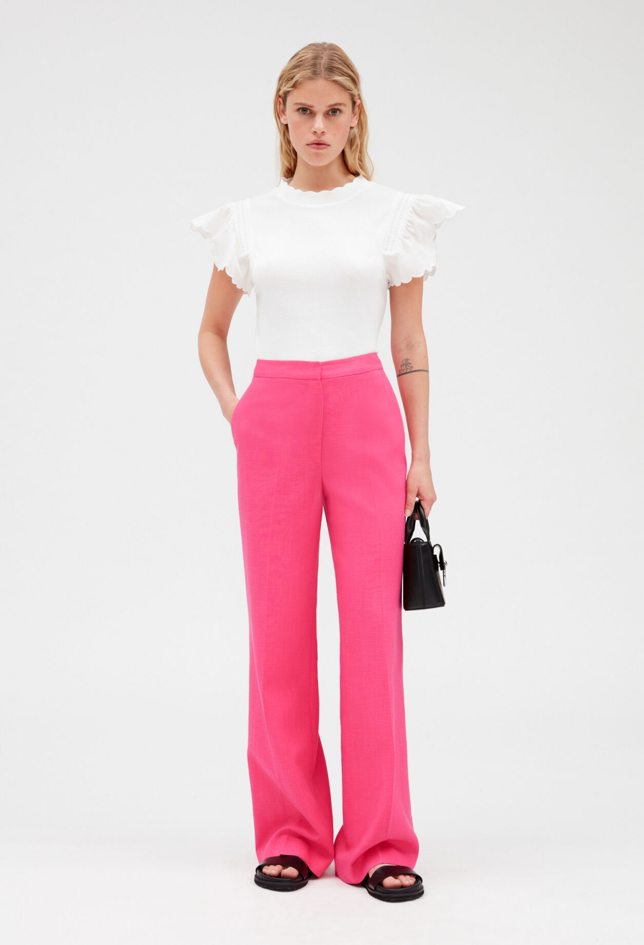 Off-white short-sleeved ruffled top