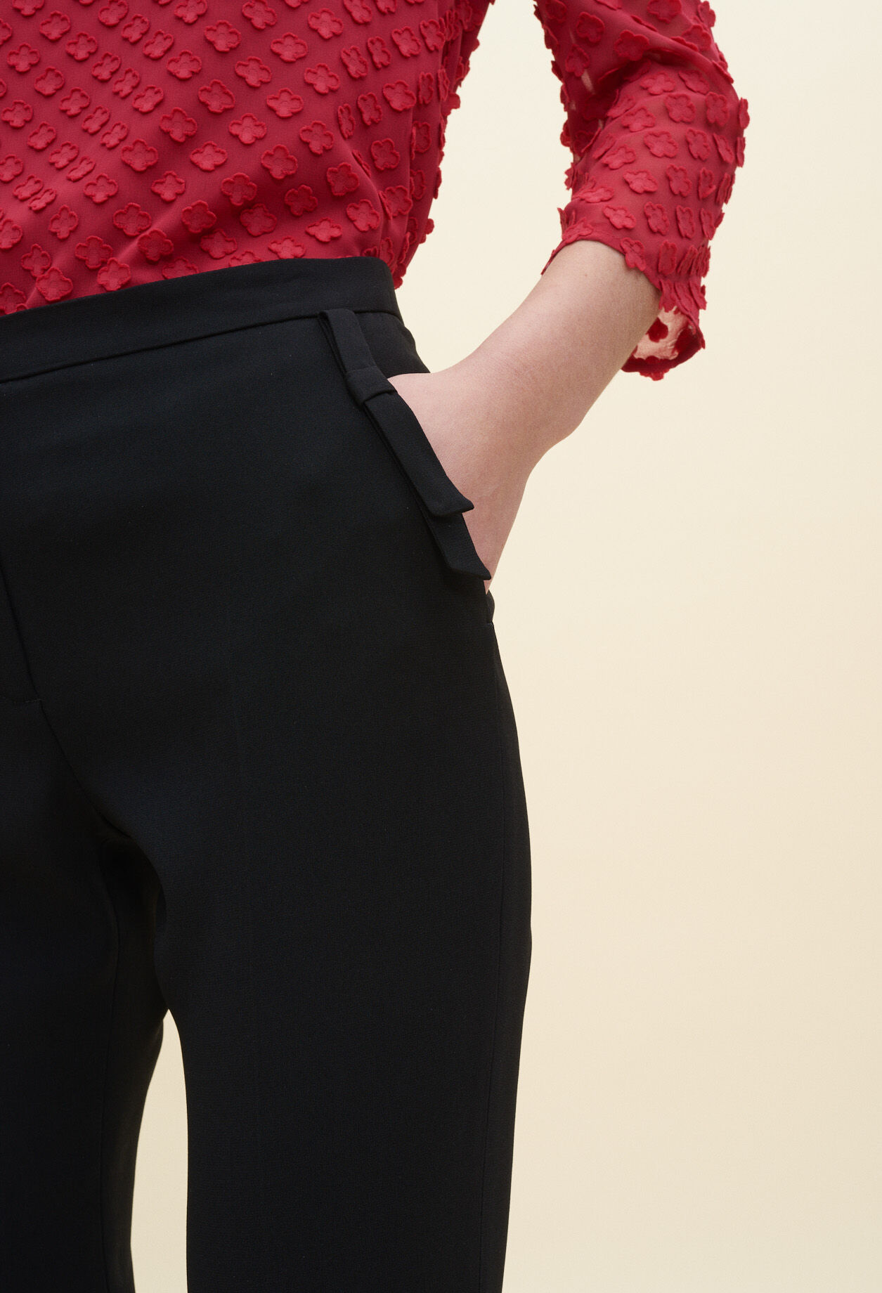Trousers with bow detail