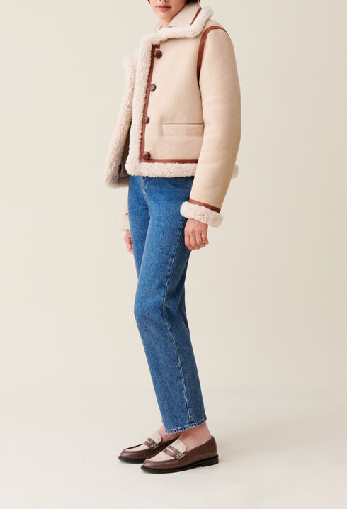 Beigefarbene Lammfelljacke
