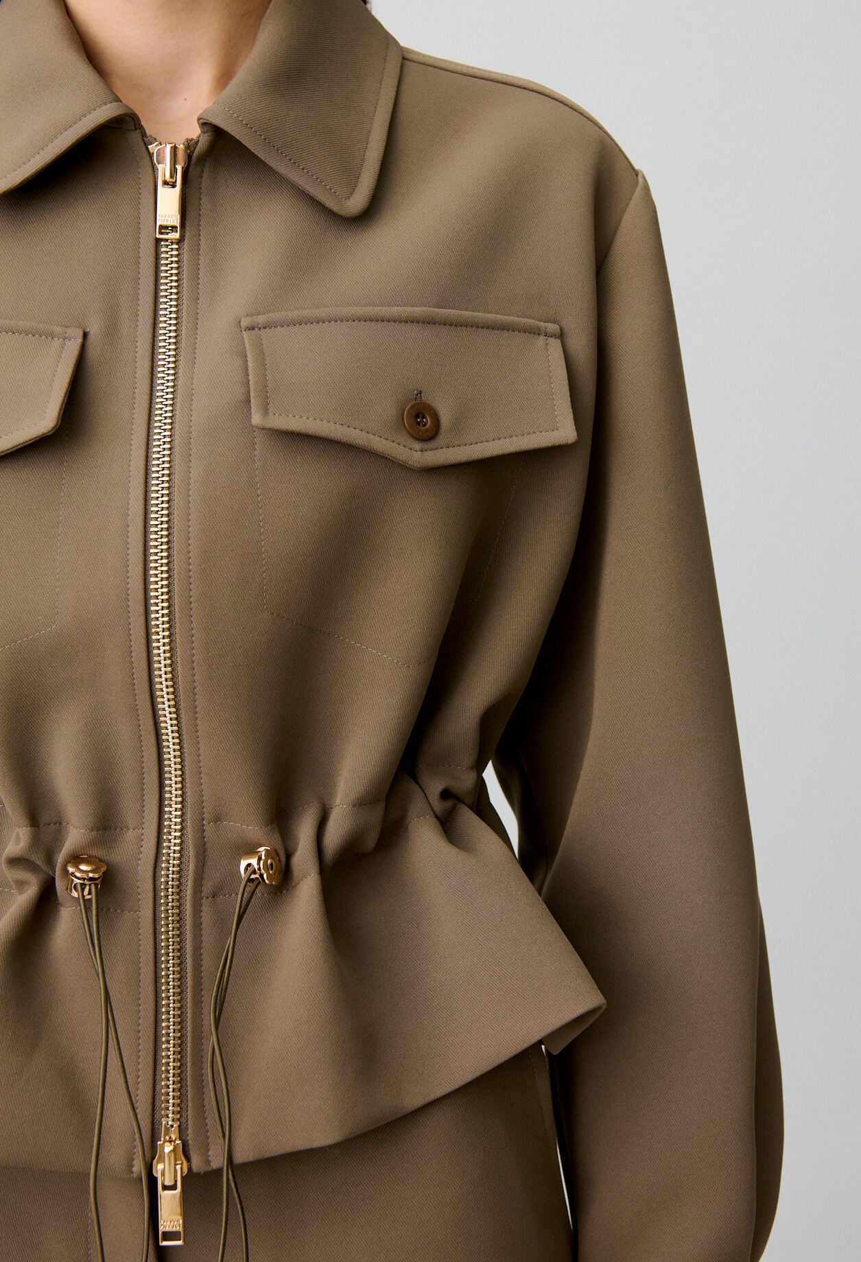 Veste &agrave; basque fleur dor&eacute;s