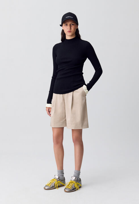 Pull près du corps