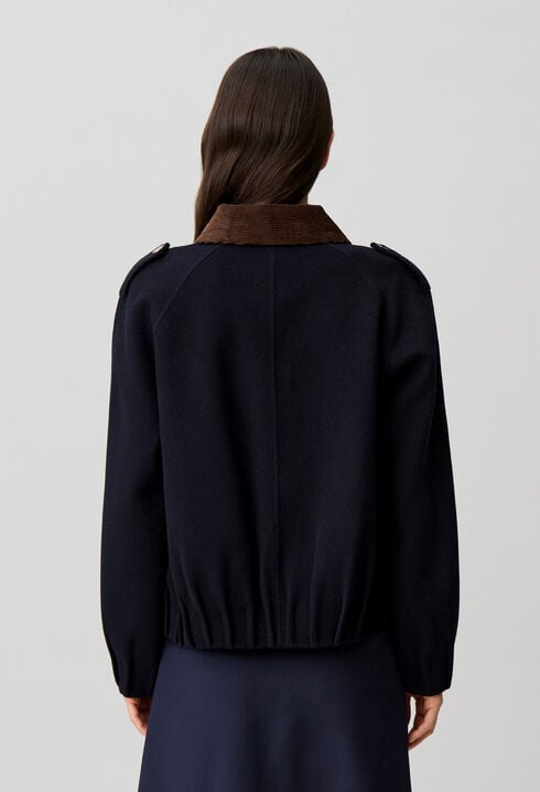 Oversized jacket with gold poppers