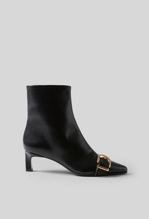 Gold buckle leather ankle boots