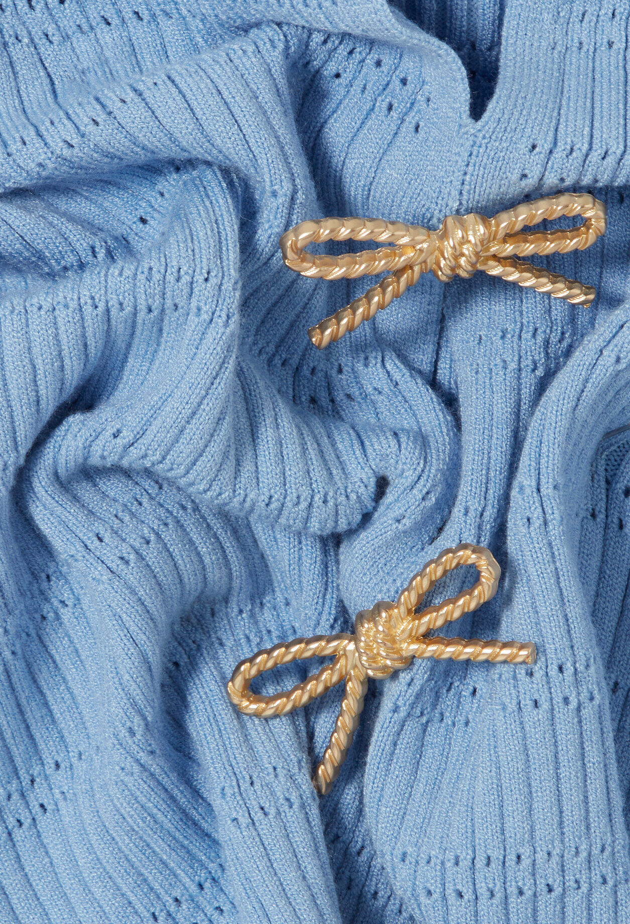 Pull maille fine nœuds