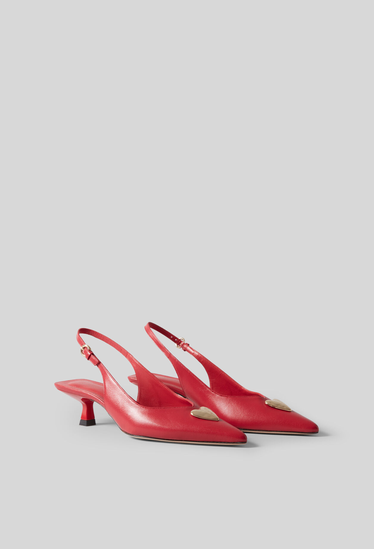 Pumps mit goldenem Herz