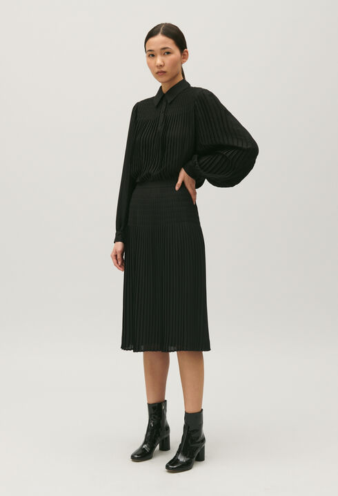 Black pleated mid-length skirt