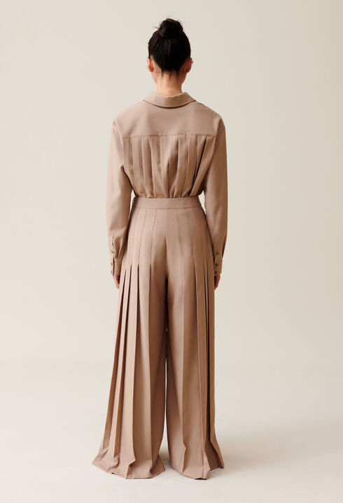 Pantalon plissé taille haute évasé
