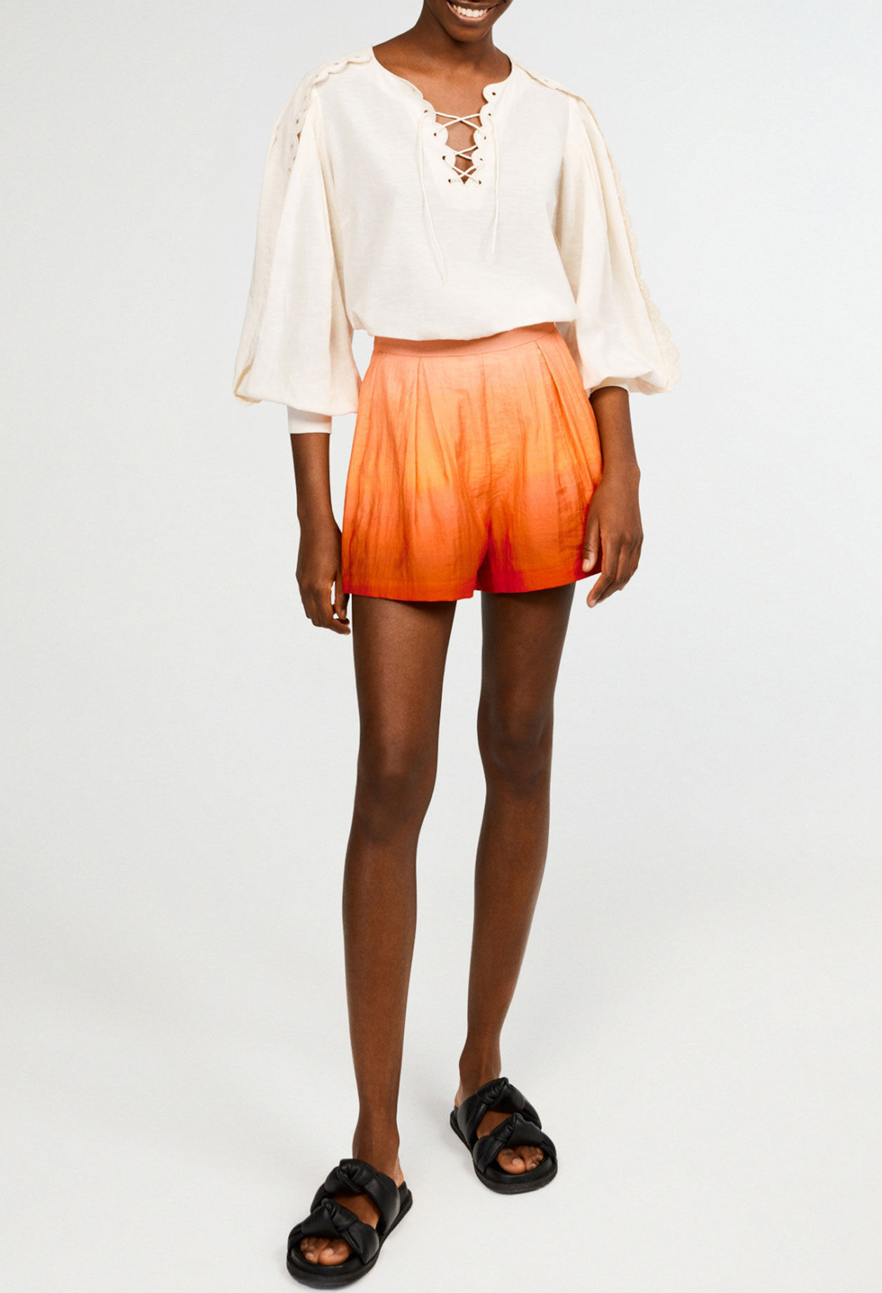 Flared pleated shorts