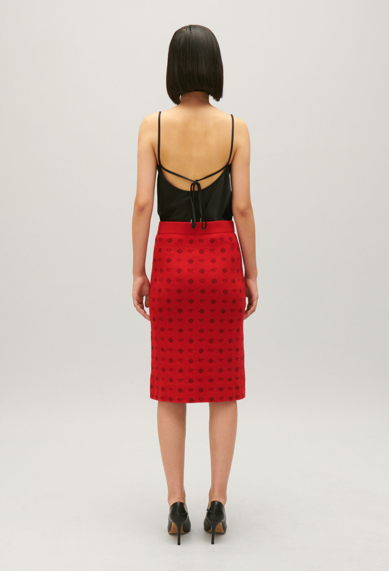 Mid-length red knit skirt