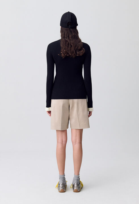Pull près du corps