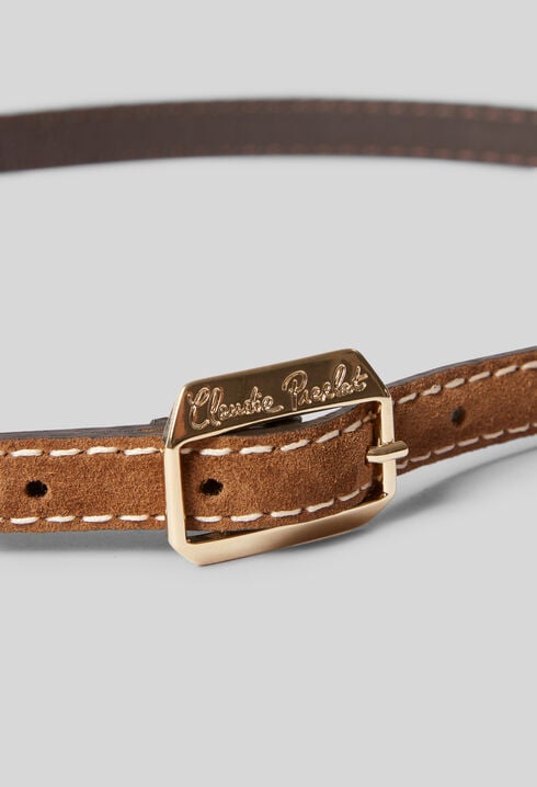 Suede belt with a gold buckle