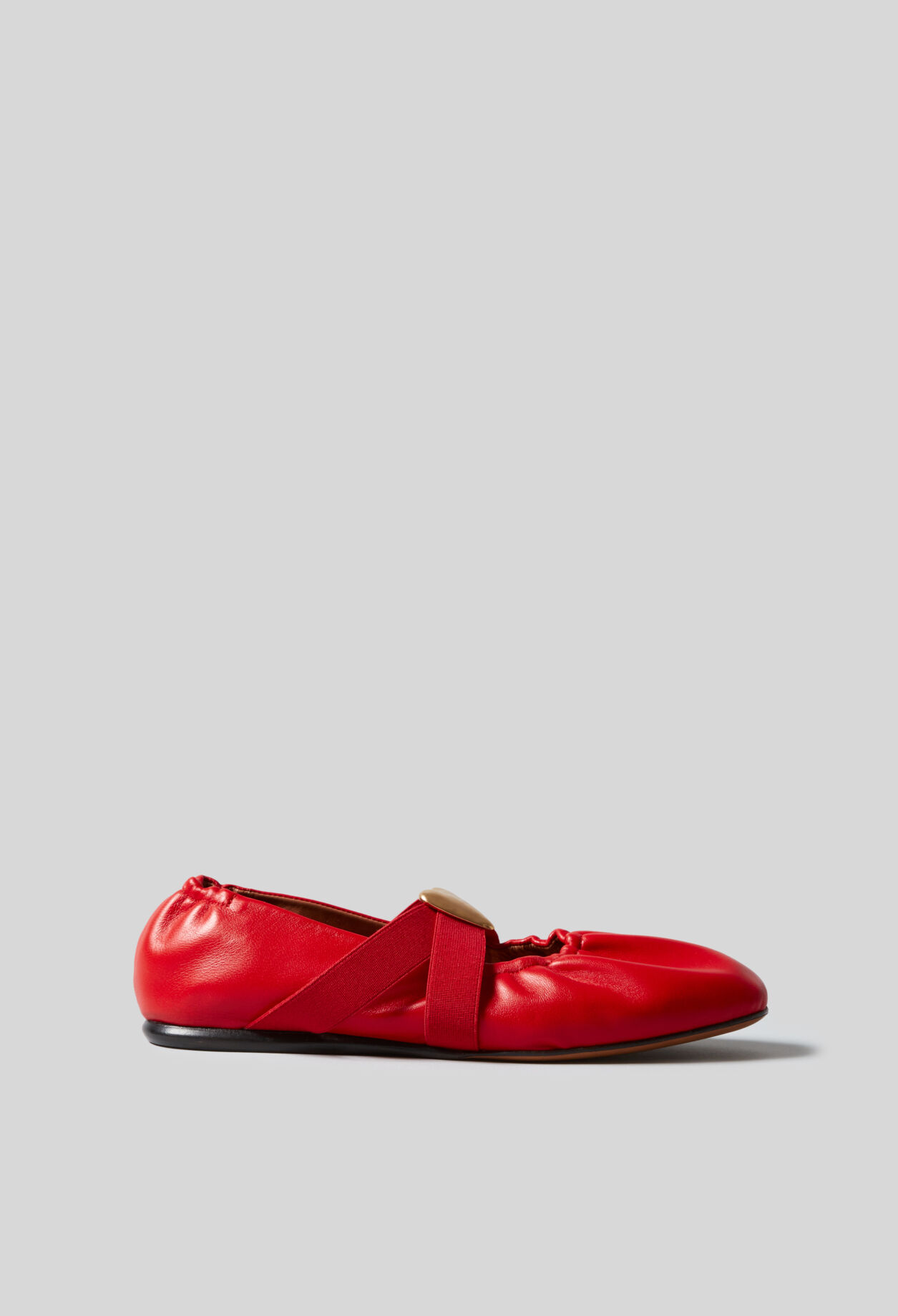 Ballerinas goldener Lederherz