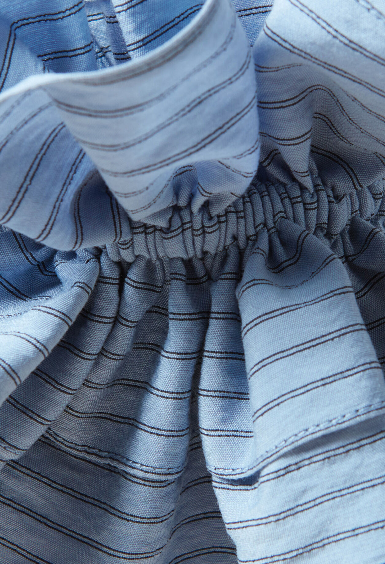 Poignets effet chemise fronces
