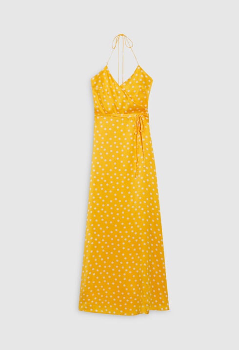 Long yellow silk wraparound dress.