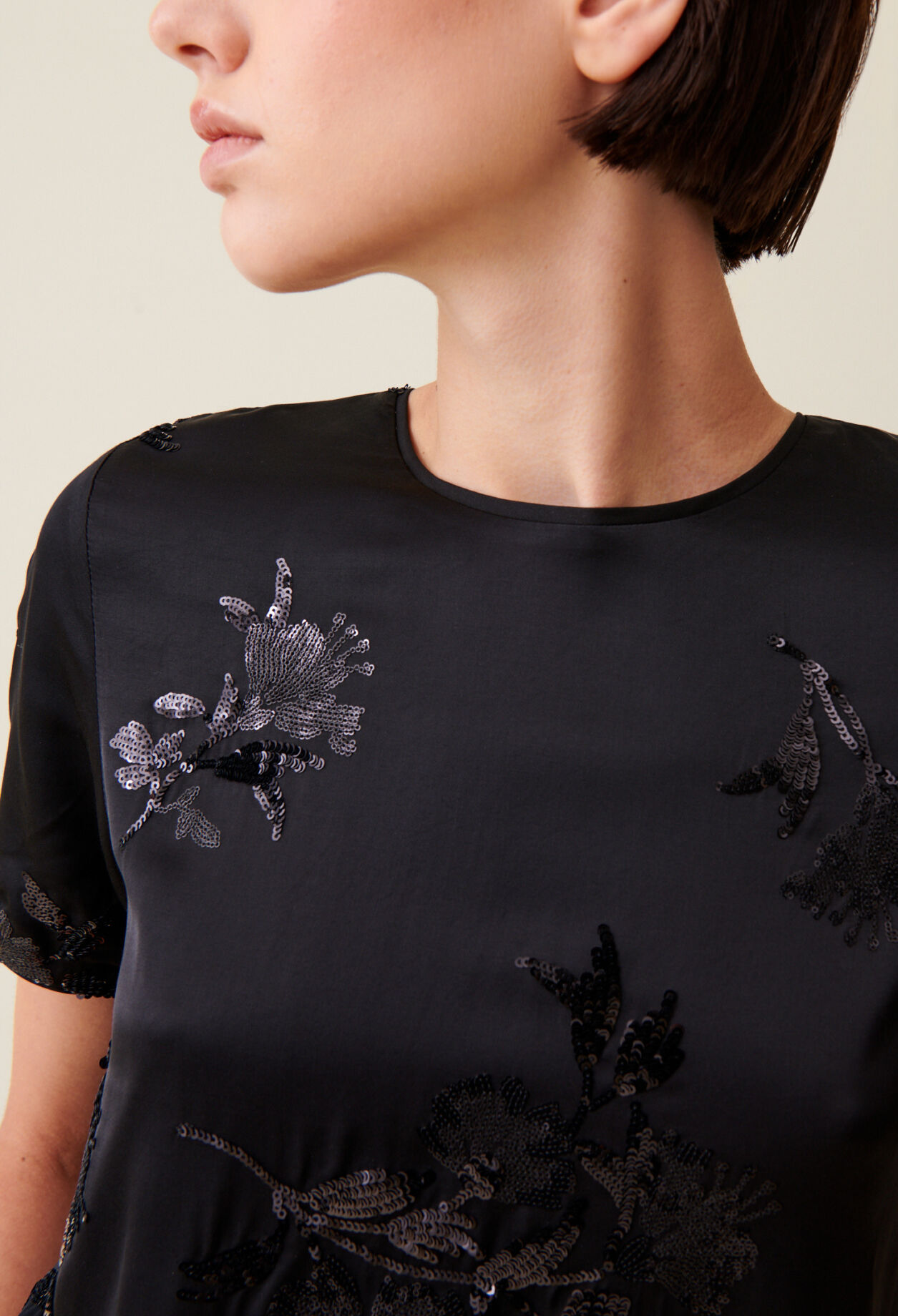 Black top with embroidered sequins