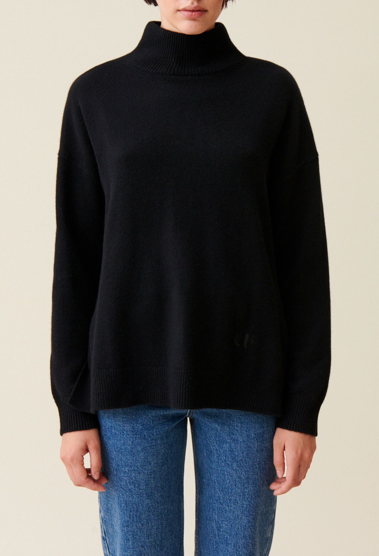 Black cashmere jumper with high neck