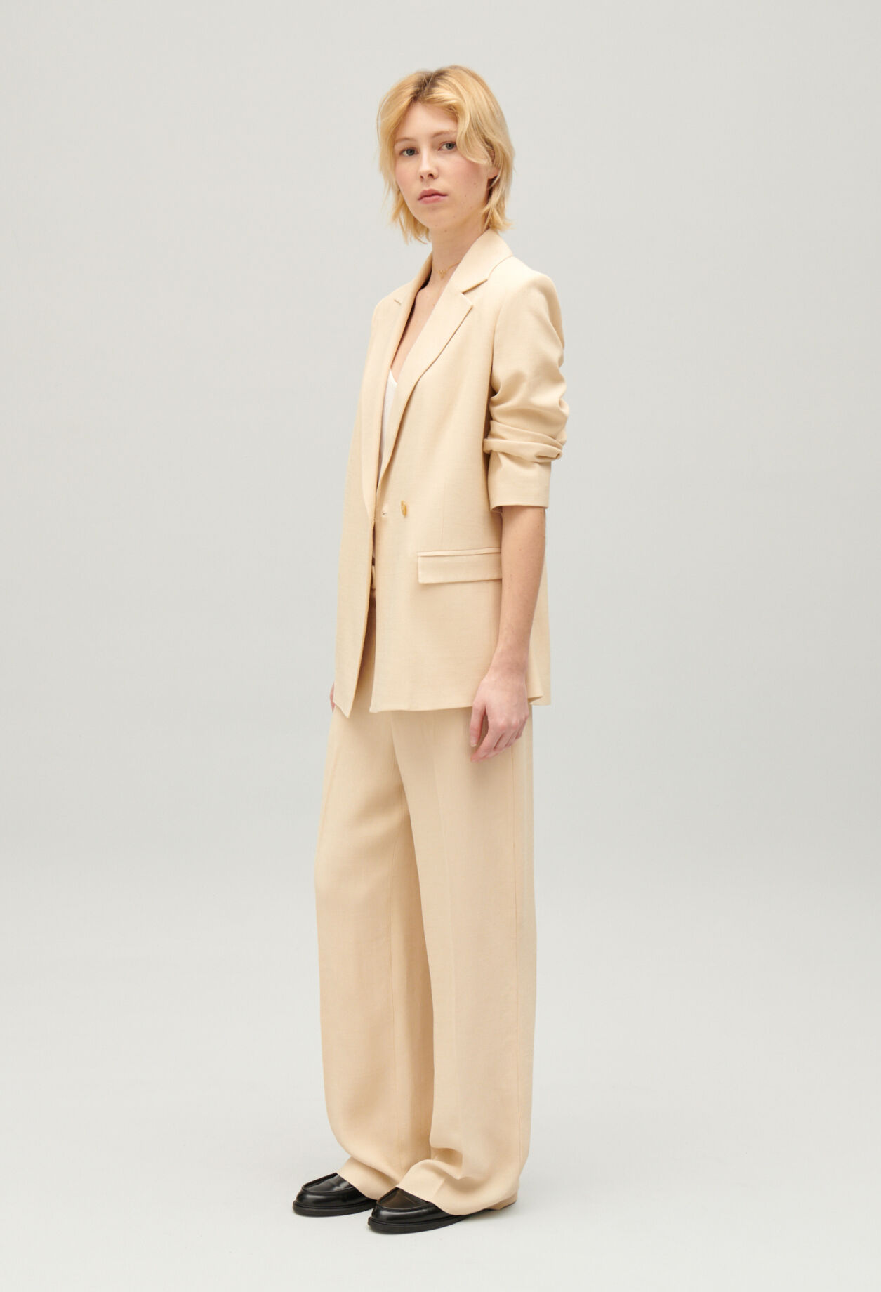 Wide-leg beige trousers