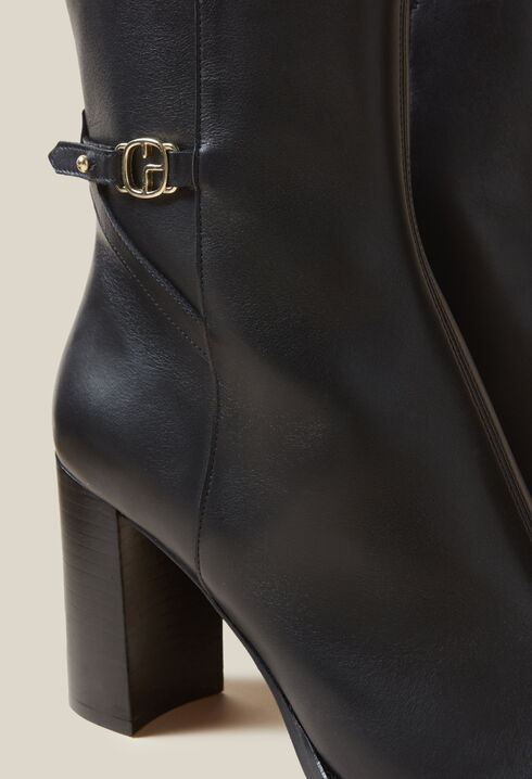 Patent leather heeled ankle boots