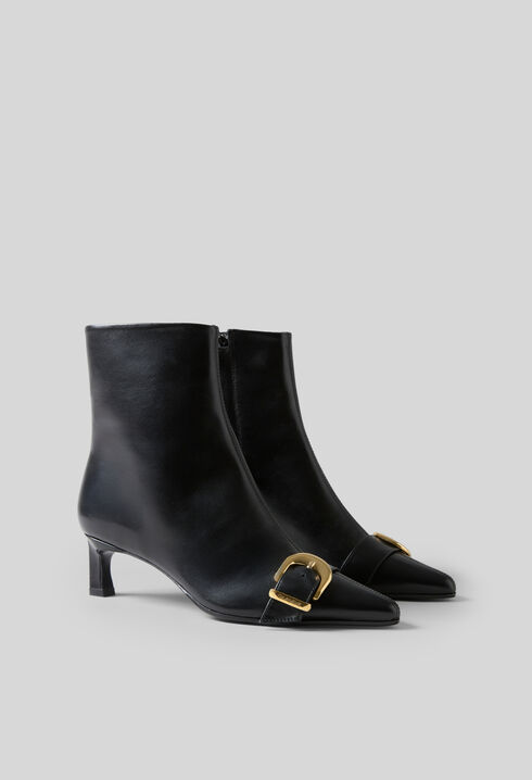 Gold buckle leather ankle boots