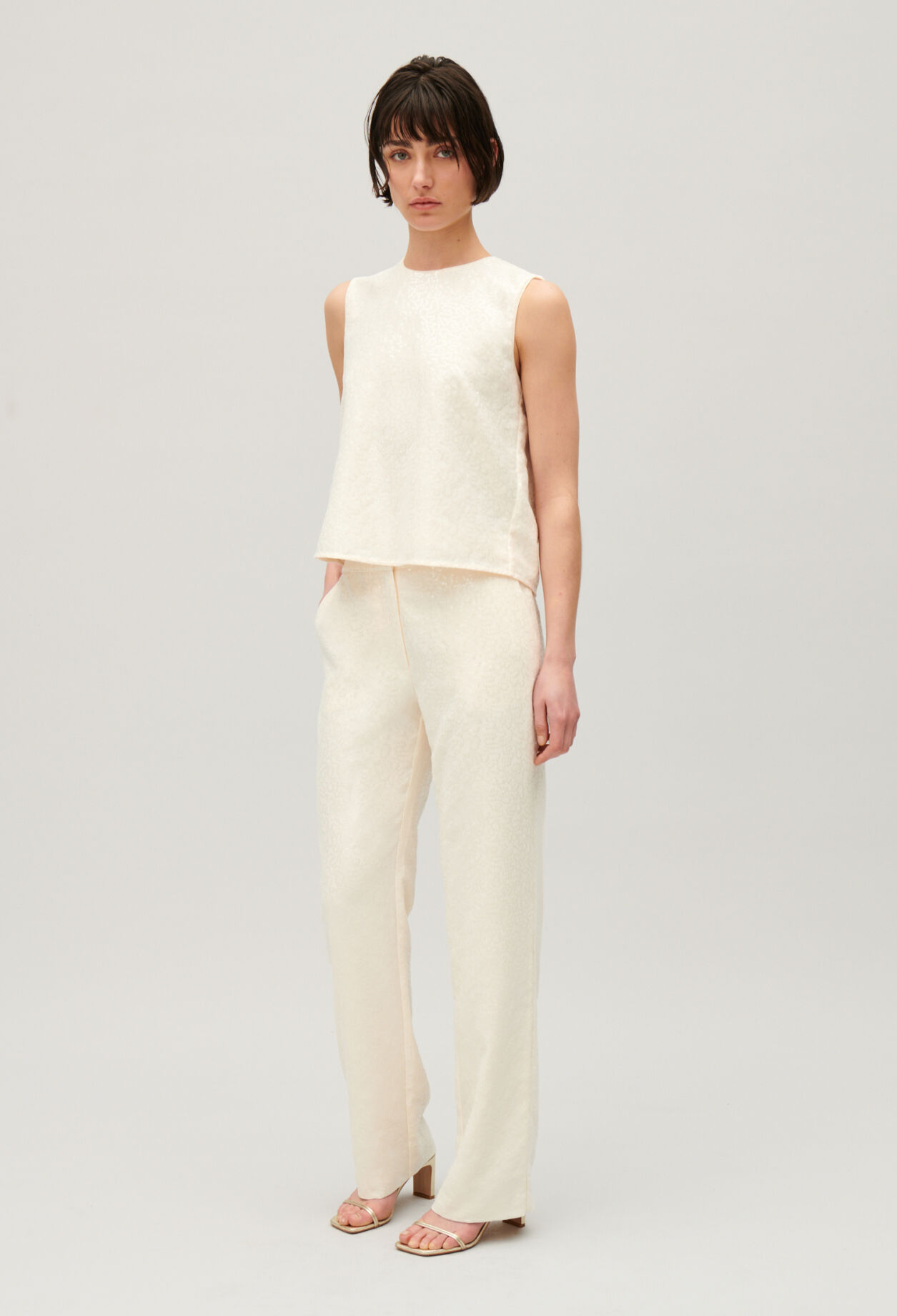 Ecru sequined sleeveless top