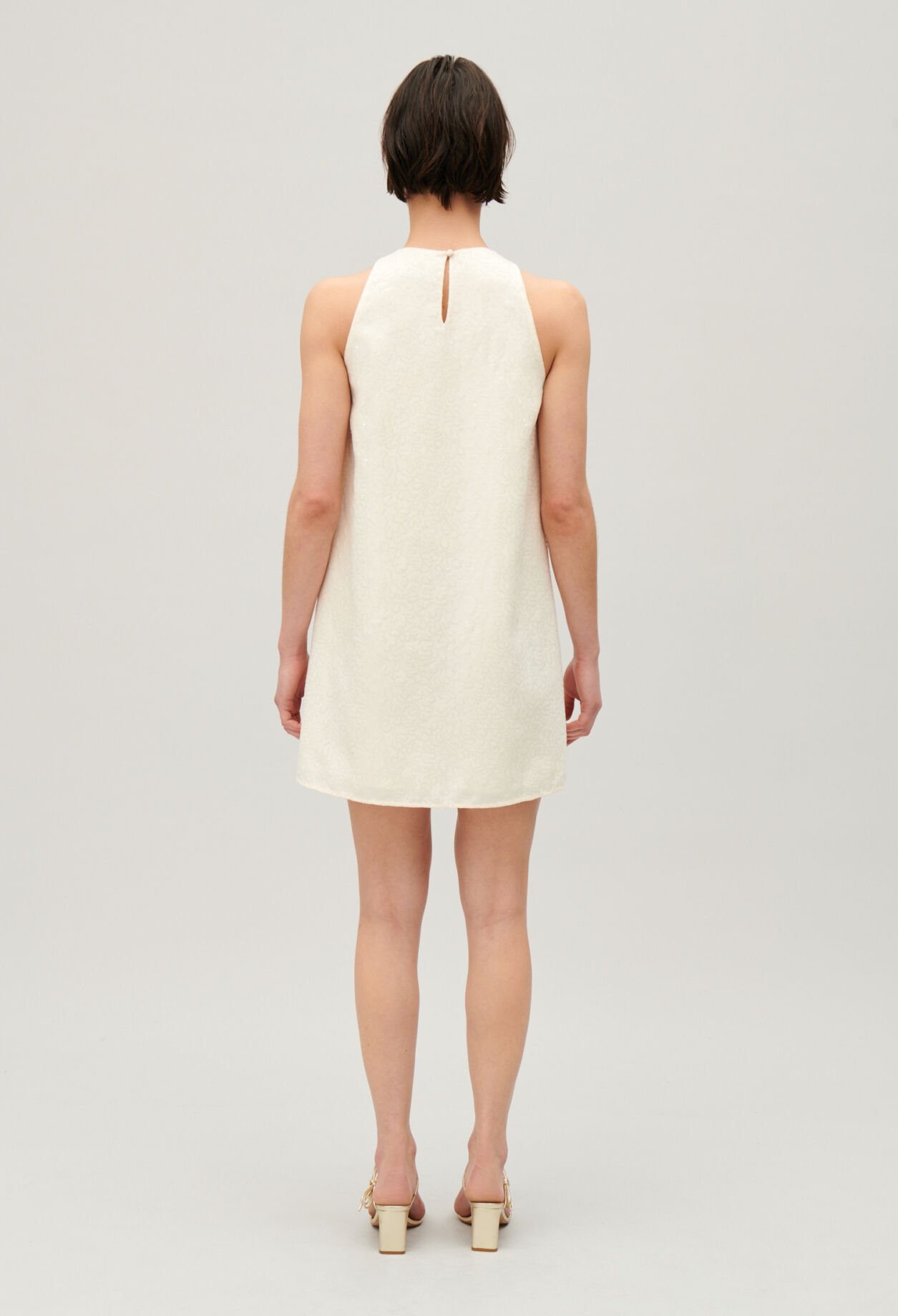 Short ecru sequinned dress