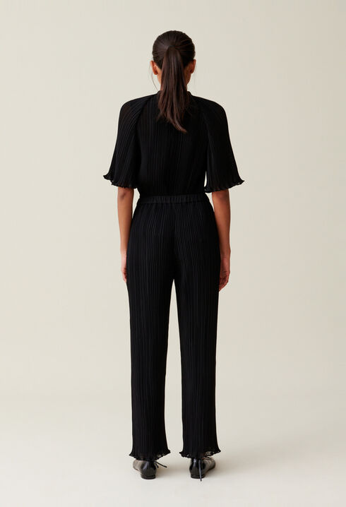 Pantalon fluide pliss&eacute; volant&eacute;