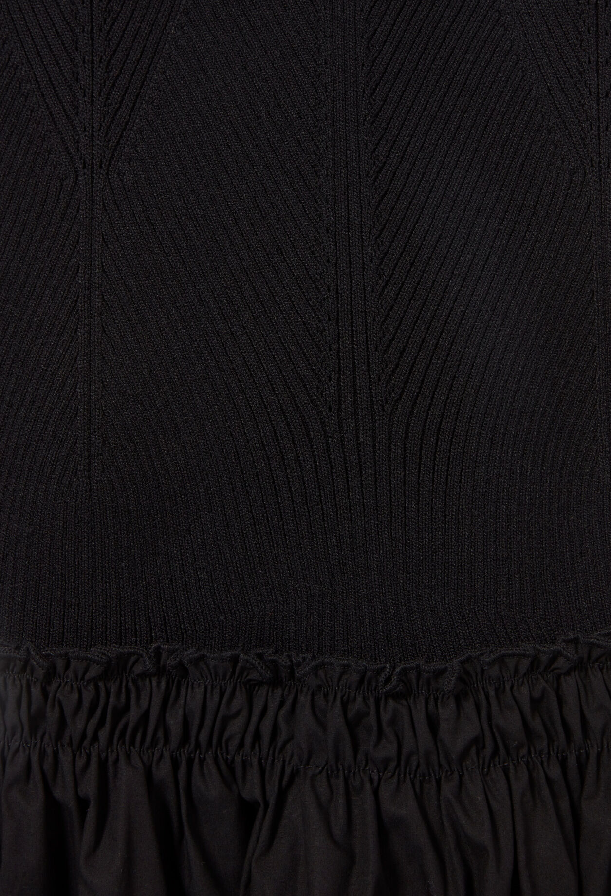 Robe mi-longue buste maille