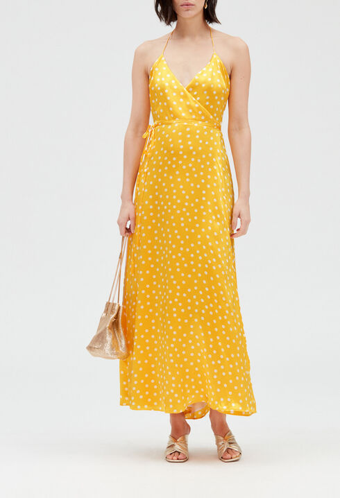 Long yellow silk wraparound dress.