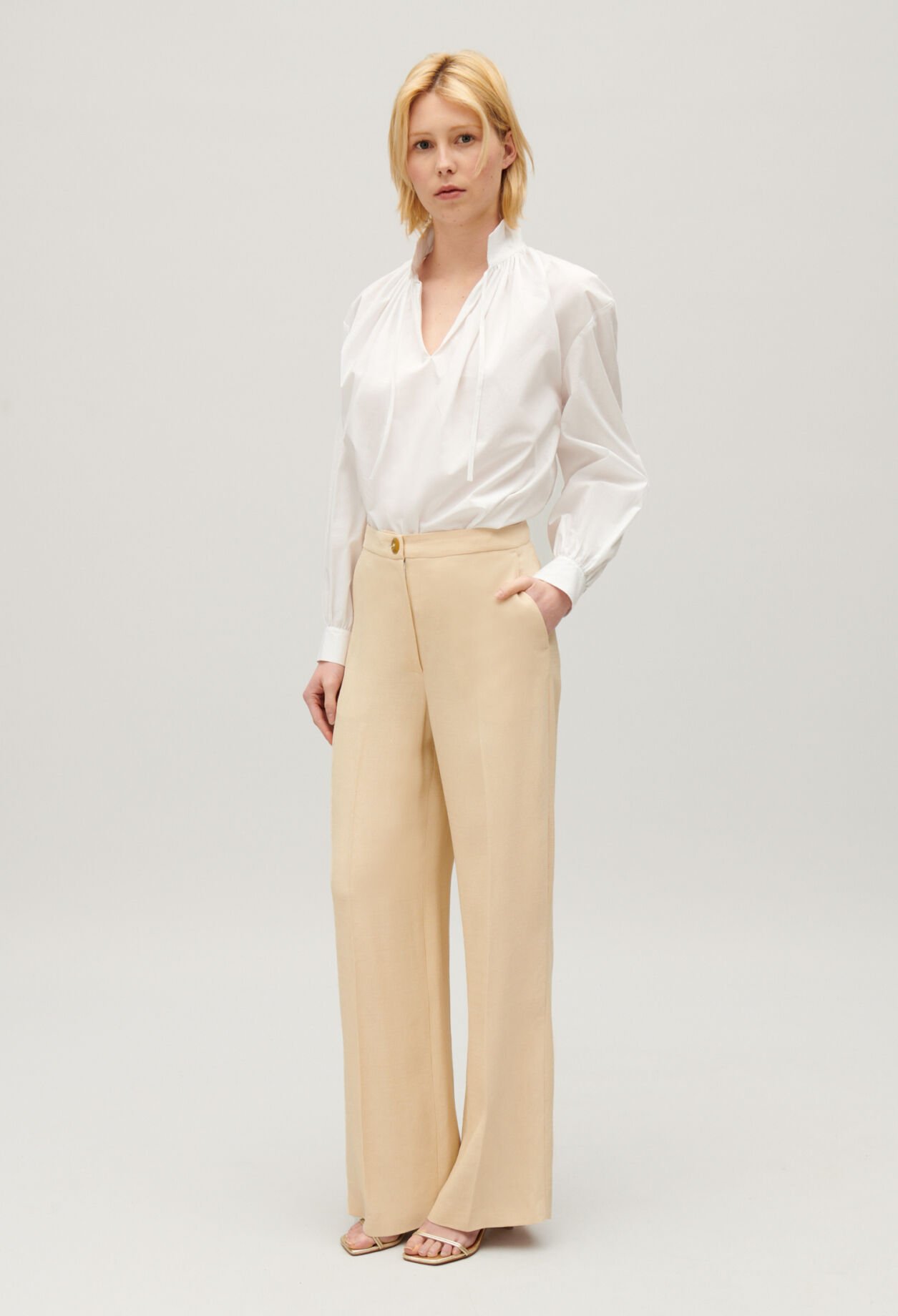 Wide-leg beige trousers