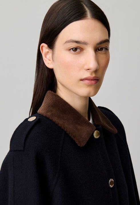 Oversized jacket with gold poppers
