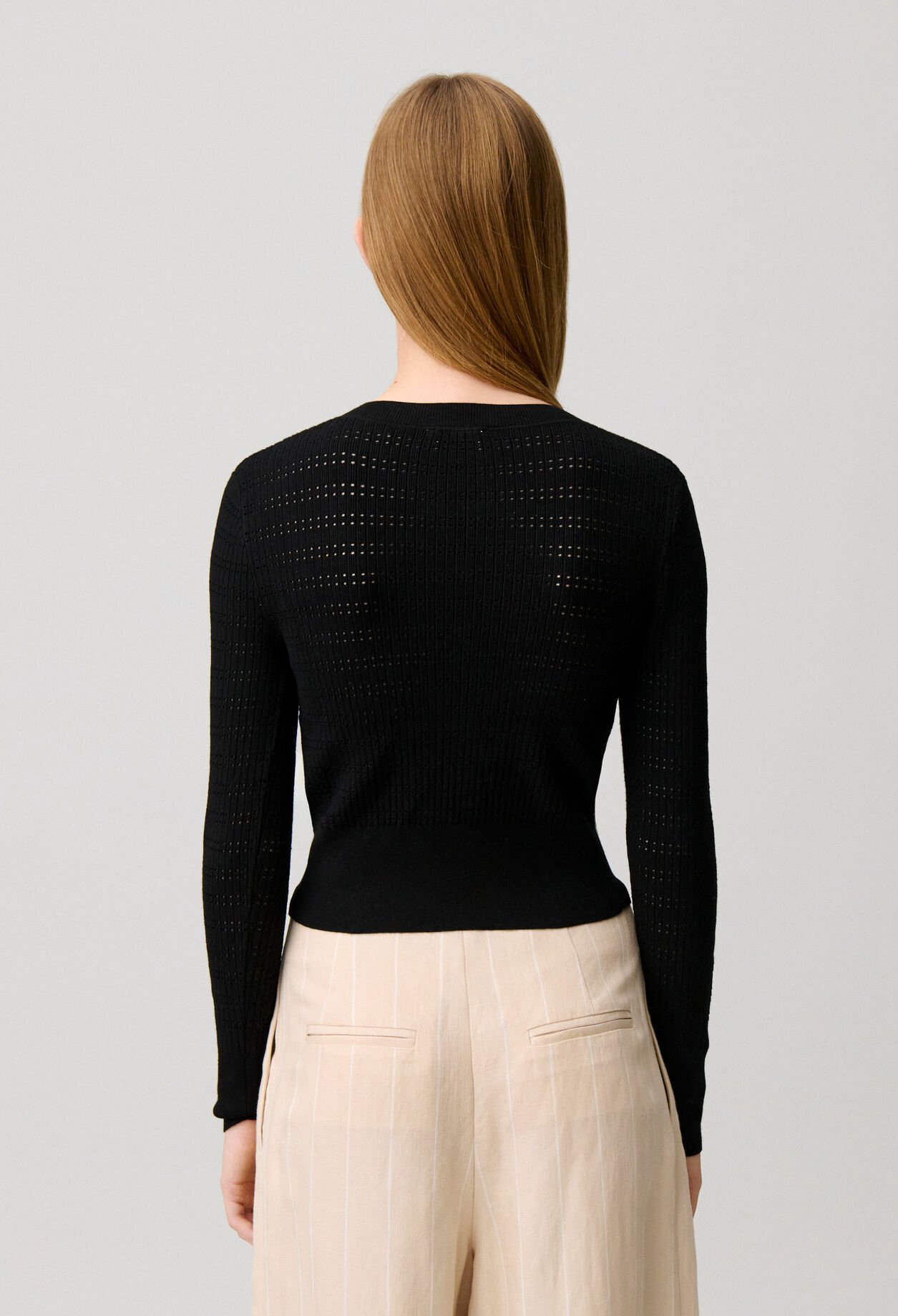 Pull maille fine noeuds